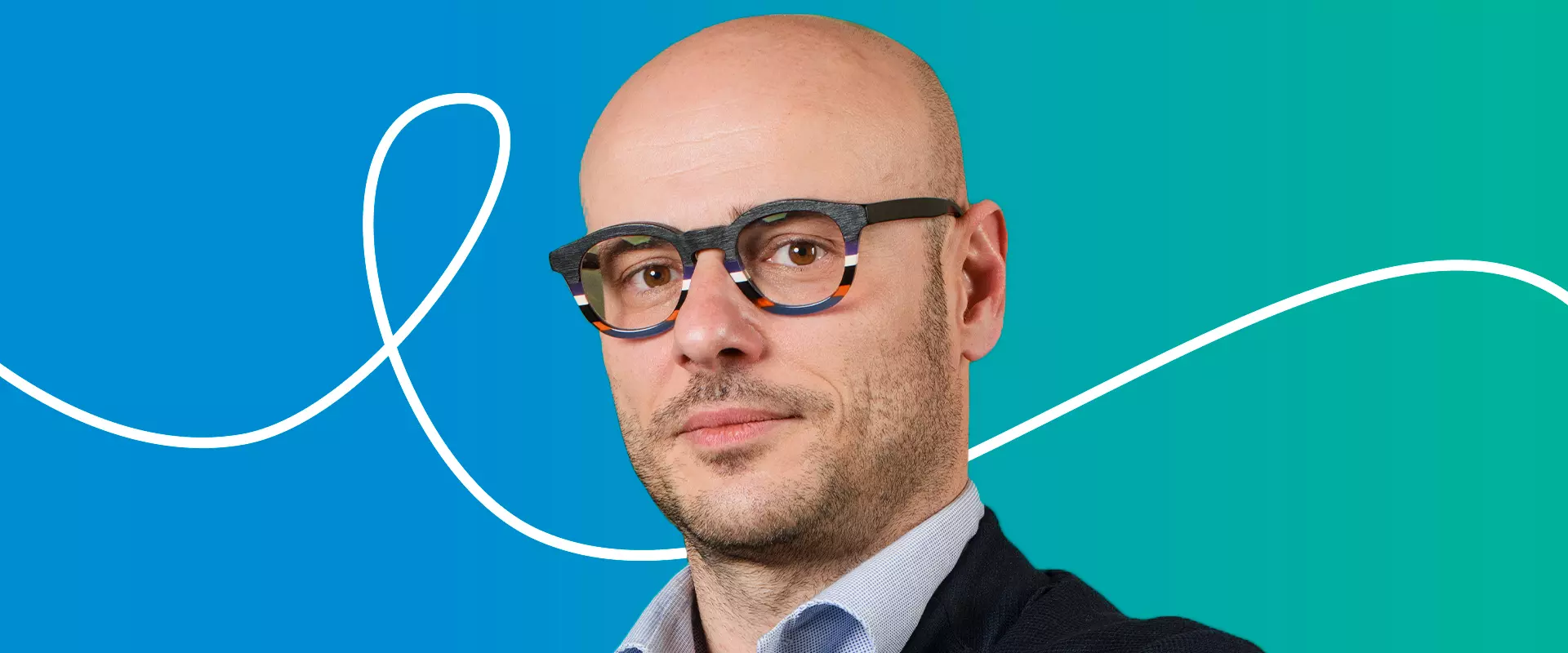 Foto di Alessandro con dietro sfondo Mundys